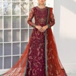 Rendered in a maroon shade, this ensemble features a net canvas gracefully adorned in multi-hued embroideries. It comes with a contrasting dupatta in orange giving it an eye catchy appeal. Front & Back Top: Sequins Embroidered Net Shirt Front & Back: Sequins Embroidered Net Sleeves: Sequins Embroidered Net Dupatta: Contrast Sequins Embroidered Net Dupatta Pallu/Laces: -Pink Organza Pallu (2 Sides) -Maroon Net Pallu (2 Sides) -Green Organza Pallu (2 Sides) -Green Organza Lace (4 Sides) Front & Back Lace: Organza Sequins Embroidered Sleeves Lace: Contrast Organza Sequins Embroidered Trouser: Dyed Raw Silk